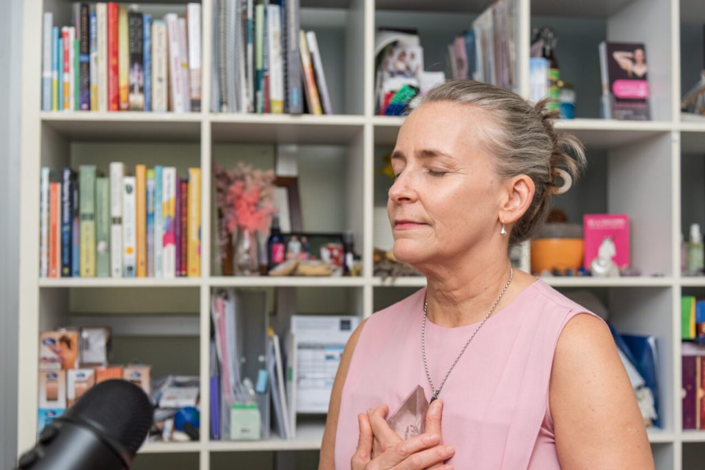 photo of Lisa Higgins with crystal